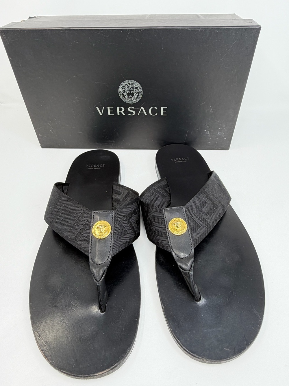 Versace Black Thong Sandals with Gold Medusa Accent